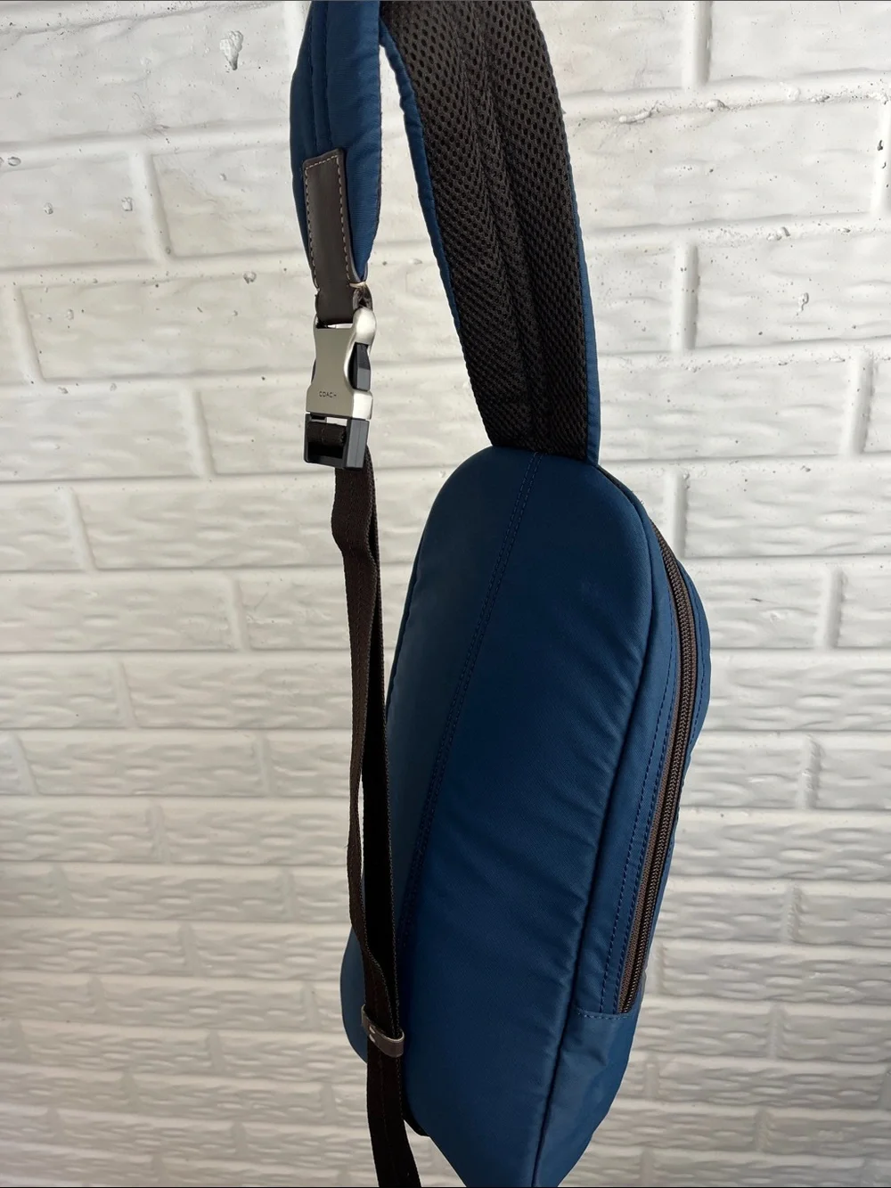 COACH Varick sling bag in navy blue / gray nylon with brown leather trim